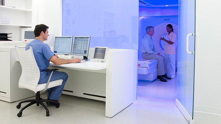 Clinician sat at a desk