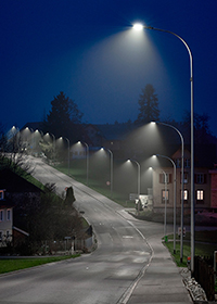 A road at night lit by street lights