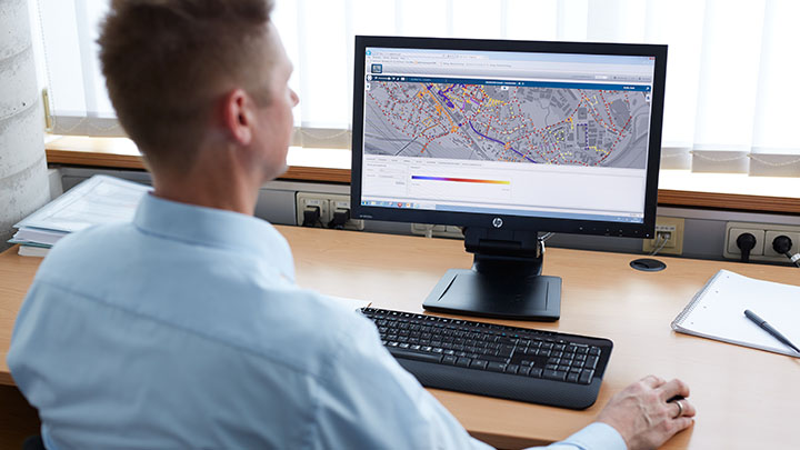 Man looking at dashboard on computer