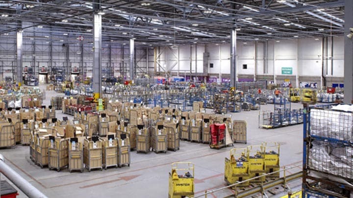 Busy warehouse shopfloor with lots of boxes