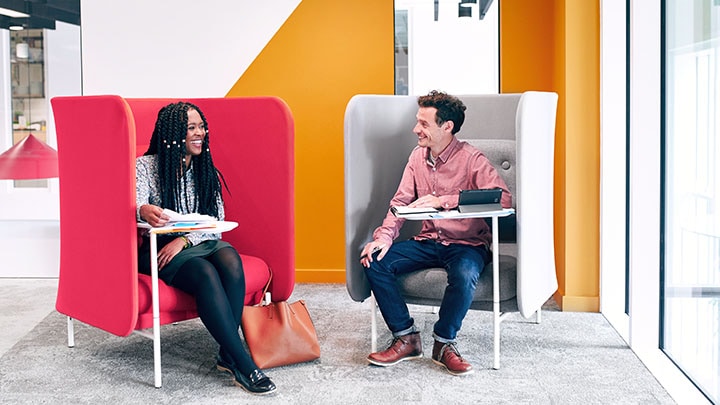 Work colleagues having meeting in creative office