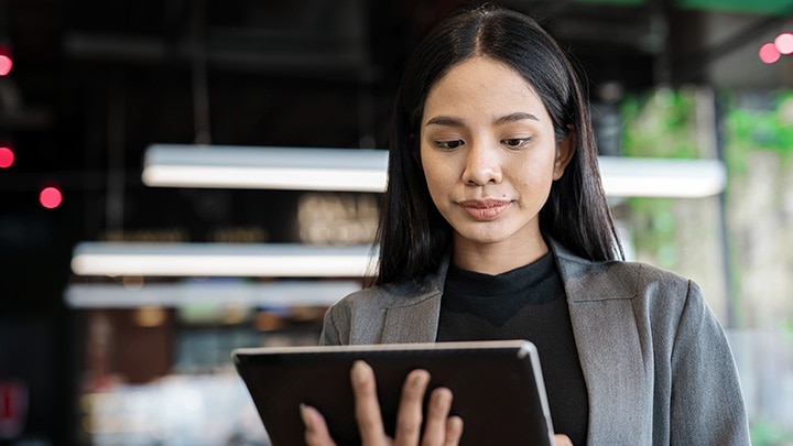 Portrait of businesswomen using tablet