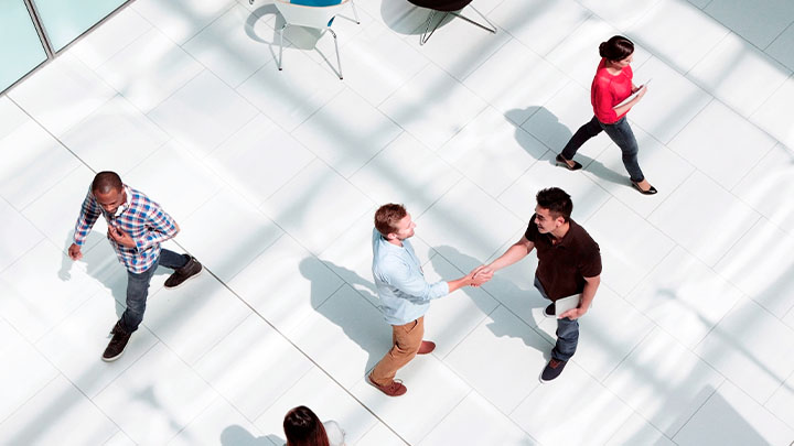 A overhead perspective of a busy office foyer